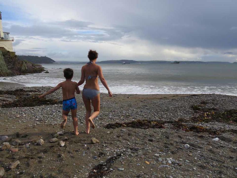 Charlotte swimming with her son (Collect/PA Real Life). 