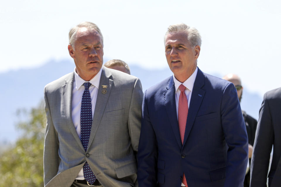 House Speaker Kevin McCarthy, R-Calif., right, walks with Representative Ryan Zinke after a bipartisan meeting with Taiwanese President Tsai Ing-wen at the Ronald Reagan Presidential Library in Simi Valley, Calif., Wednesday, April 5, 2023. (AP Photo/Ringo H.W. Chiu)