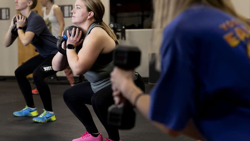 Jody Reid, a mother of three who reversed her Type 2 diabetes through exercise and diet, participates in a fitness class at Roy CrossFit in Roy on Wednesday, Nov. 9, 2022.