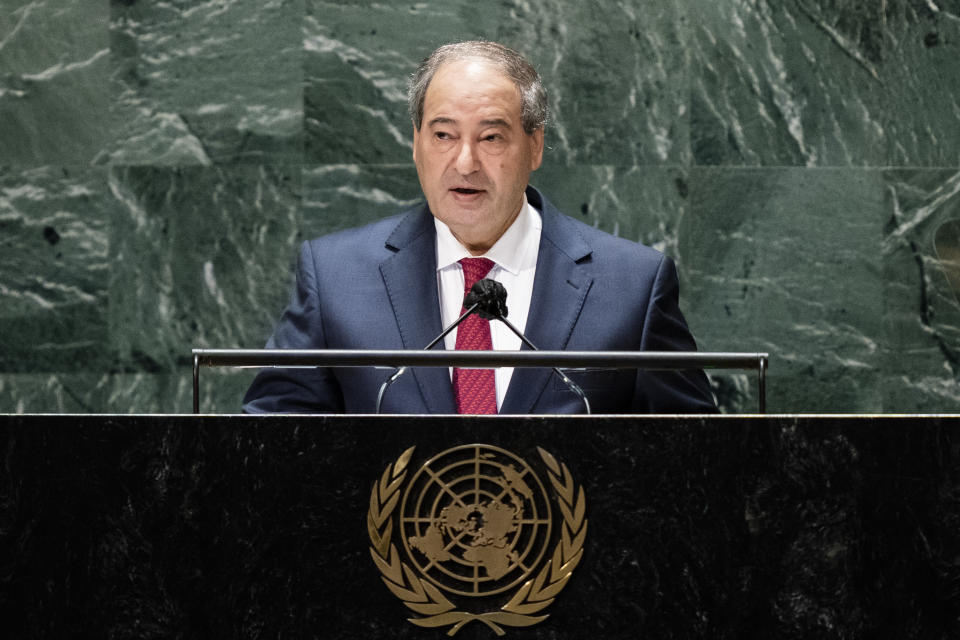 Syria's foreign minister Faisal Mekdad addresses the 76th Session of the United Nations General Assembly, Monday, Sept. 27, 2021, at U.N. headquarters. (AP Photo/John Minchillo, Pool)