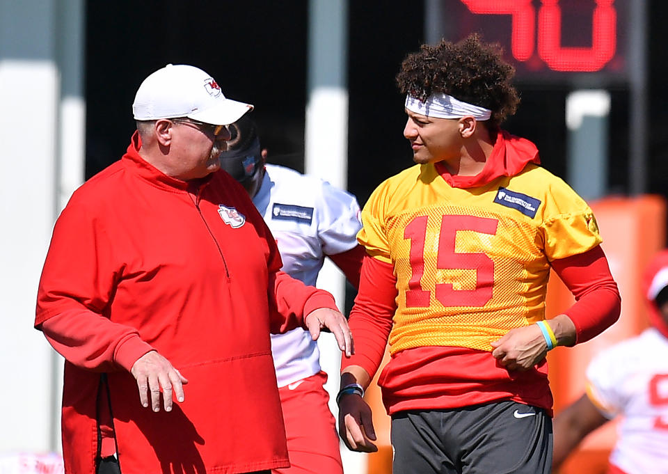 Head coach Andy Reid and quarterback Patrick Mahomes collaborate at practice this week as they plan for Super Bowl LIV against the 49ers. (Photo by Mark Brown/Getty Images)