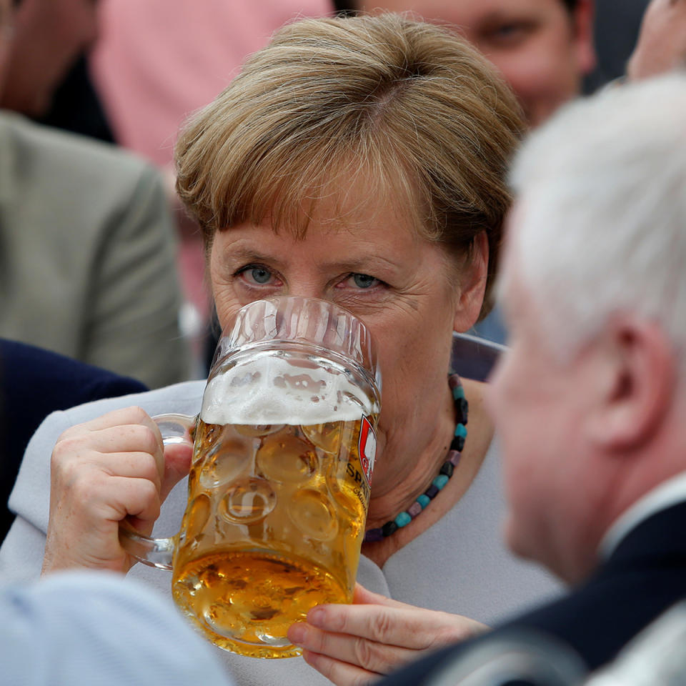 <p>German Chancellor and head of the Christian Democratic Union (CDU) Angela Merkel drinks during the Trudering festival in Munich, Germany, May 28, 2017. (Photo: Michaela Rehle/Reuters) </p>