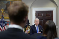 FILE - In this May 13, 2021, file photo President Joe Biden responds to questions from the media after delivering remarks about the Colonial Pipeline hack, in the Roosevelt Room of the White House in Washington. The Centers for Disease Control and Prevention said Thursday that fully vaccinated people — those who are two weeks past their last required dose of a COVID-19 vaccine — can stop wearing masks outdoors in crowds and in most indoor settings. Across Washington, the government is adjusting in a variety of ways to new federal guidance easing up on when face masks should be worn. (AP Photo/Evan Vucci, File)