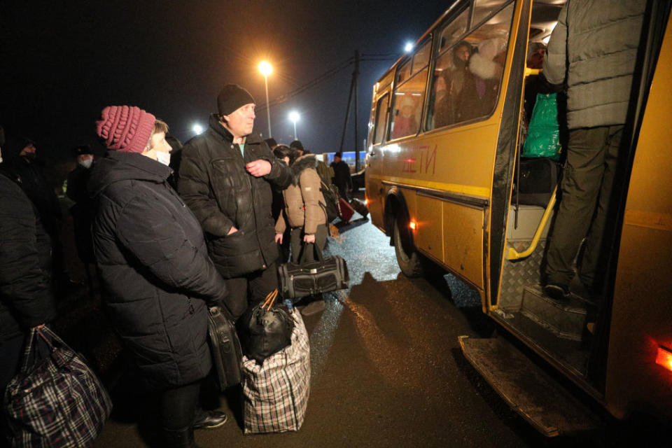 Evacuees from the Donetsk People's Republic are to be sent to a refugee camp after arriving at the Matveyev Kurgan border crossing checkpoint in Matveyevo-Kurgansky District of Russia's Rostov-on-Don Region. Source: Erik Romanenko/TASS via Getty Images