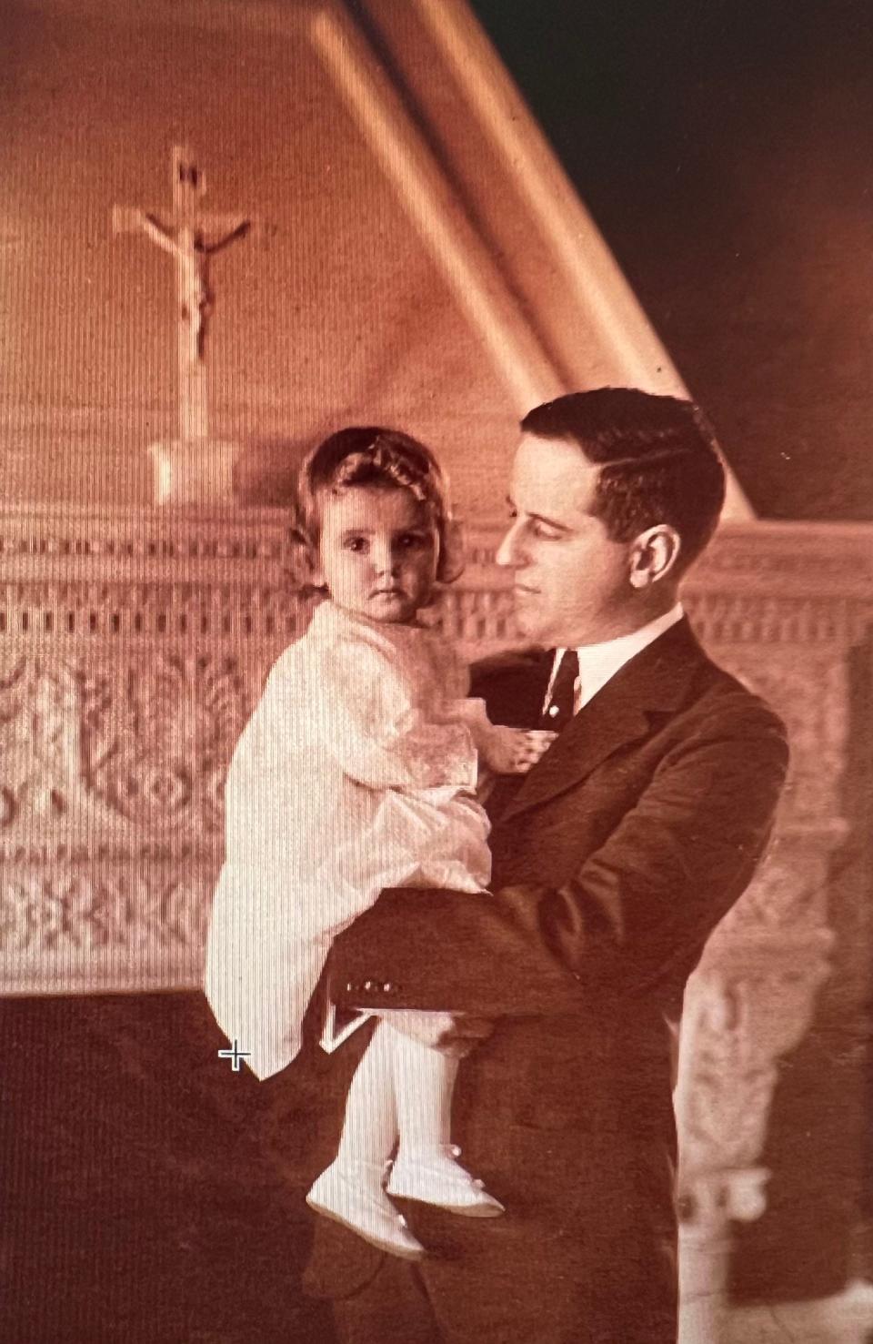 H. Wendell Endicott holding his daughter, about 1925.