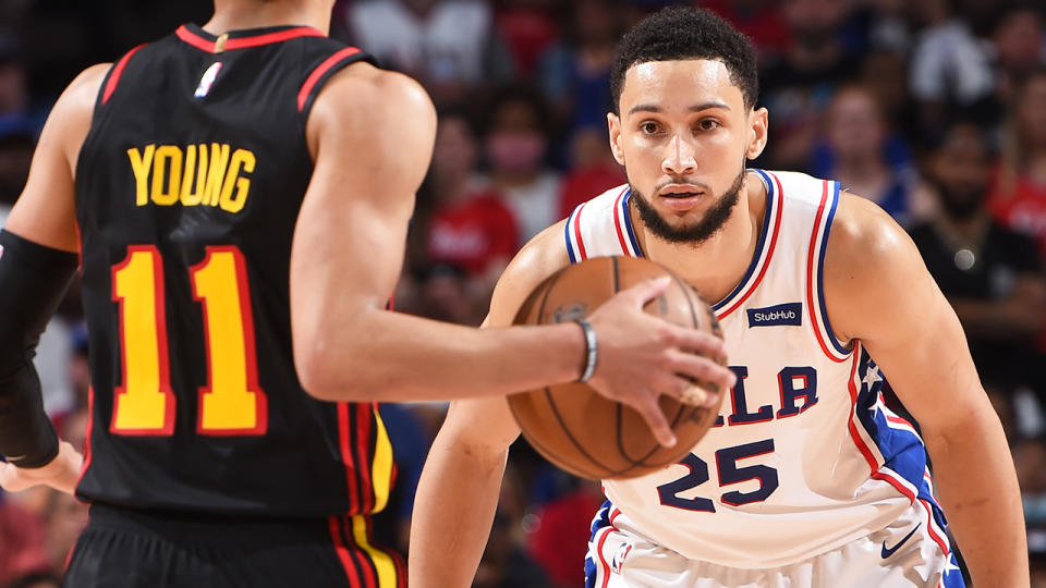 Ben Simmons gets in position to guard Atlanta's Trae Young during the NBA Playoffs.