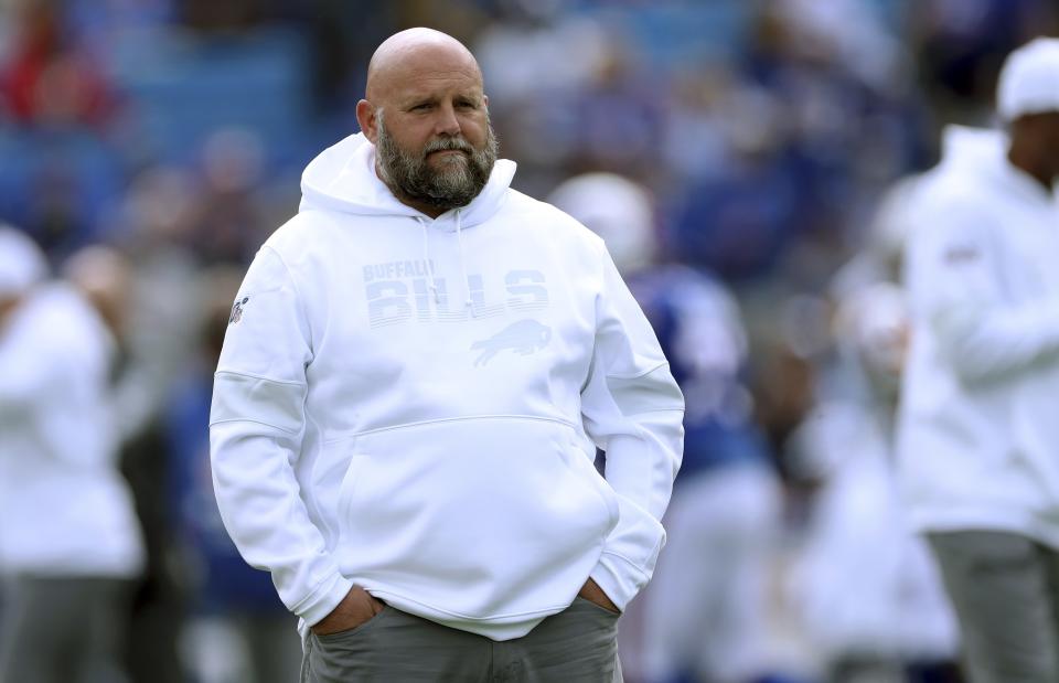 FILE - In this Sept. 29, 2019, file photo, Buffalo Bills offensive coordinator Brian Daboll watches the team warm up for an NFL football game against the New England Patriots in Orchard Park, N.Y. The likelihood of Daboll staying in Buffalo for at least more season have increased after he was passed over in filling the Los Angeles Chargers coaching job, two people with direct knowledge of Daboll's plans told The Associated Press. (AP Photo/Ron Schwane, File)