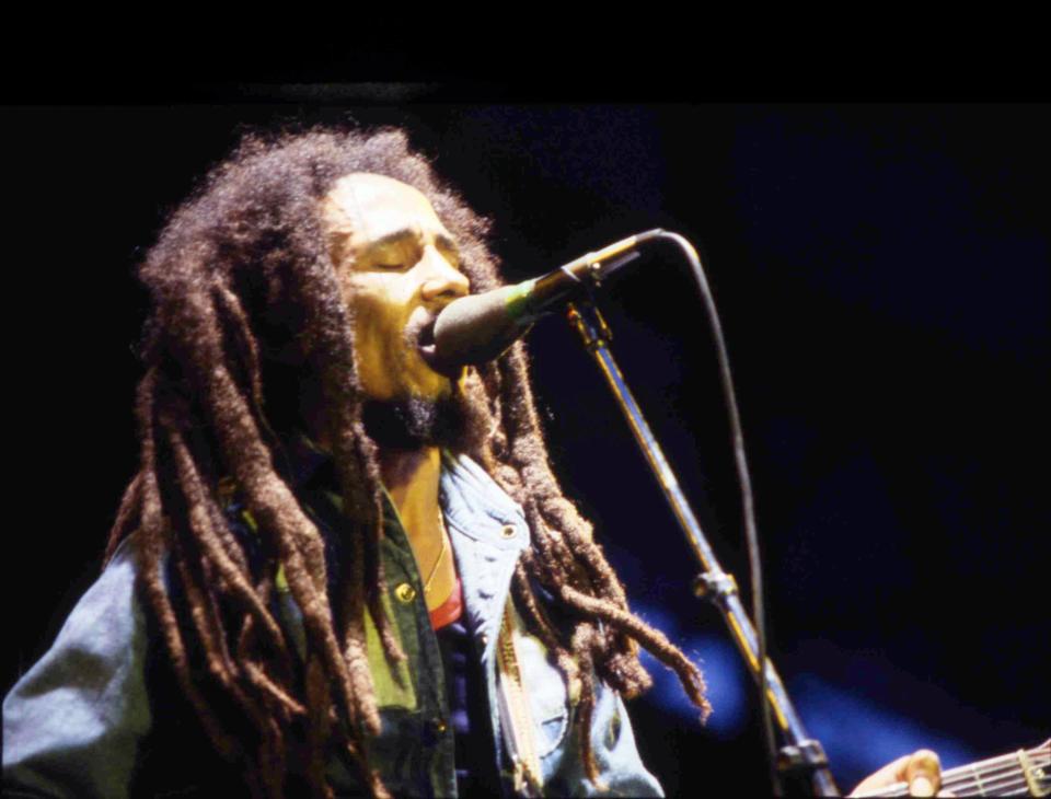 Jamaican Reggae singer Bob Marley performs on stage during a concert in Bourget, Paris, on July 3, 1980. (AP Photo/Str)