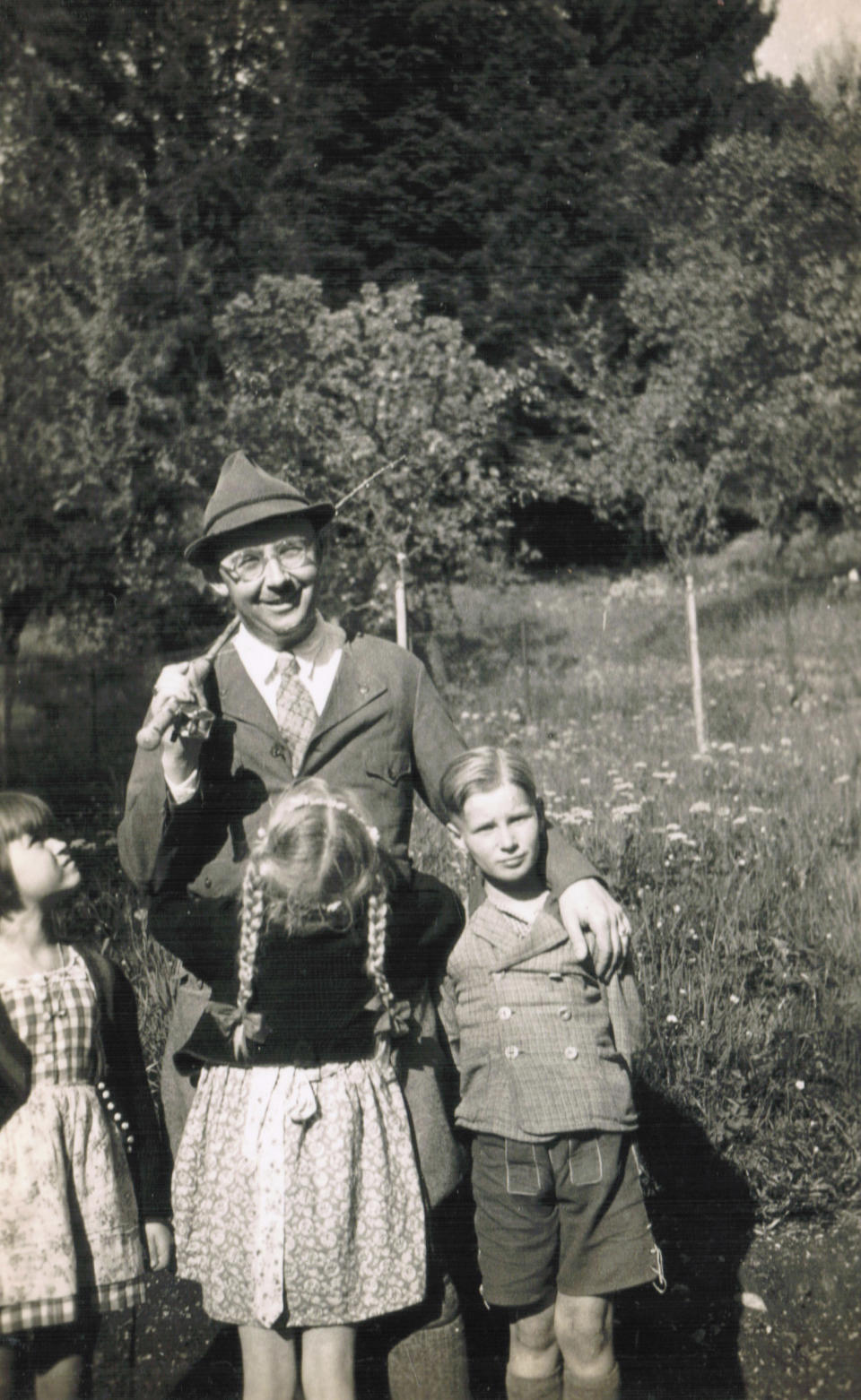 1935 photo provided by German newspaper 'Die Welt' shows a family photo of Heinrich Himmler in Valepp, Bavaria. The picture shows Himmler with his daughter Gudrun, front, his son Gerhard, right, and a friend of Gudrun, left. The photo is part of a trove of letters, notes and photos that were in possession of an Israeli family. The letters are believed to be written by Nazi SS leader Heinrich Himmler and had not been shown to the public. The newspaper said the material is contained in an eight-part series it plans to publish. Himmler is considered one of the Nazis most responsible for the Holocaust. (AP Photo/Realworks Ltd./DIE WELT, HO) MANDATORY CREDIT Realworks Ltd./DIE WELT - http://www.welt.de/geschichte/himmler/article124223862/Insight-into-the-orderly-world-of-a-mass-murderer.html