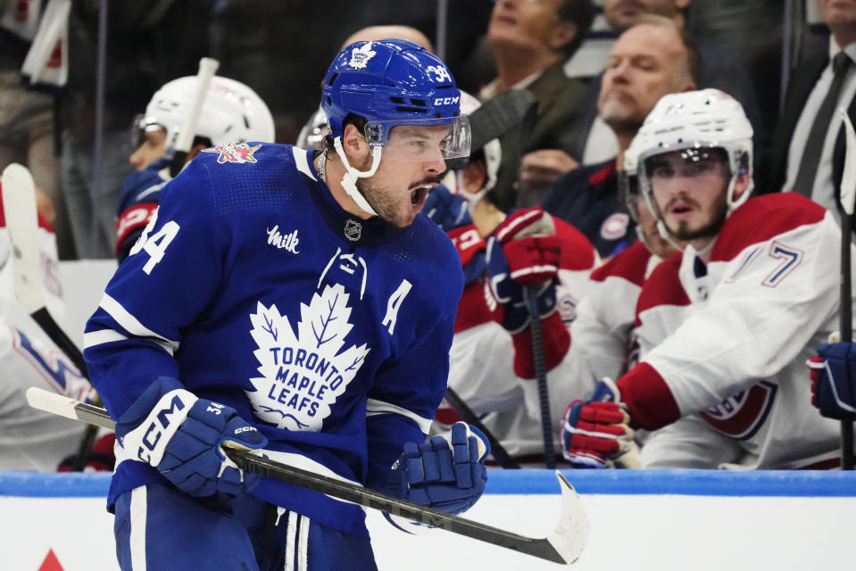 Toronto Maple Leafs' Auston Matthews (34) celebrates his goal against the Montreal Canadiens during the third period of an NHL hockey game Wednesday, Oct. 11, 2023, in Toronto. (Frank Gunn/The Canadian Press via AP)