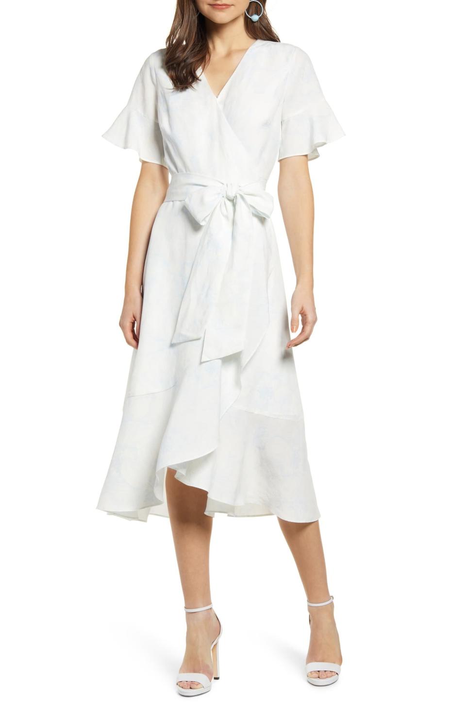 <b>Buy It! </b>Rachel Parcell Ruffle Wrap Dress, $159; <a href="https://click.linksynergy.com/deeplink?id=93xLBvPhAeE&mid=1237&murl=https%3A%2F%2Fshop.nordstrom.com%2Fs%2Frachel-parcell-ruffle-wrap-dress-nordstrom-exclusive%2F5162308&u1=PEO%2CShopping%3A15GorgeousWrapDressestoShopThisSummer%2CInspiredbyMeghanMarkleandMoreCelebs%2Crcarhart31%2CUnc%2CGal%2C7085788%2C201905%2CI" rel="nofollow noopener" target="_blank" data-ylk="slk:nordstrom.com;elm:context_link;itc:0;sec:content-canvas" class="link ">nordstrom.com</a>