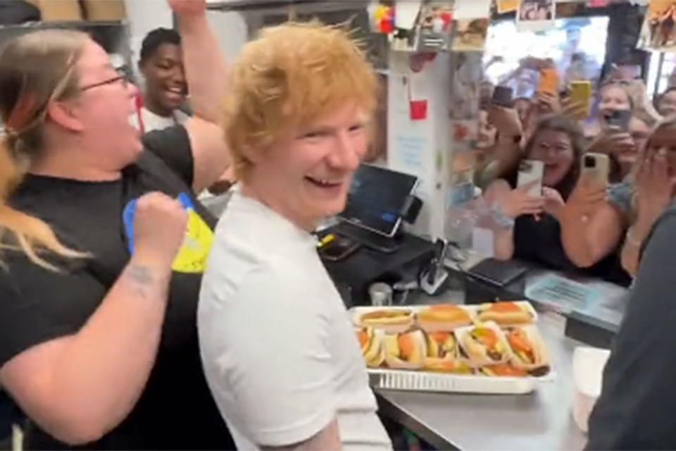 <p>twitter</p> Ed Sheeran at The Wieners Circle in Chicago, where he served hot dogs before performing at Soldier Field on July 29.