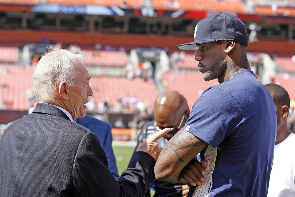 Dallas Cowboys team owner Jerry Jones talks with then-Cleveland Cavaliers star LeBron James on Sept. 7, 2008 at Cleveland Browns Stadium in Cleveland, Ohio. (Getty Images)