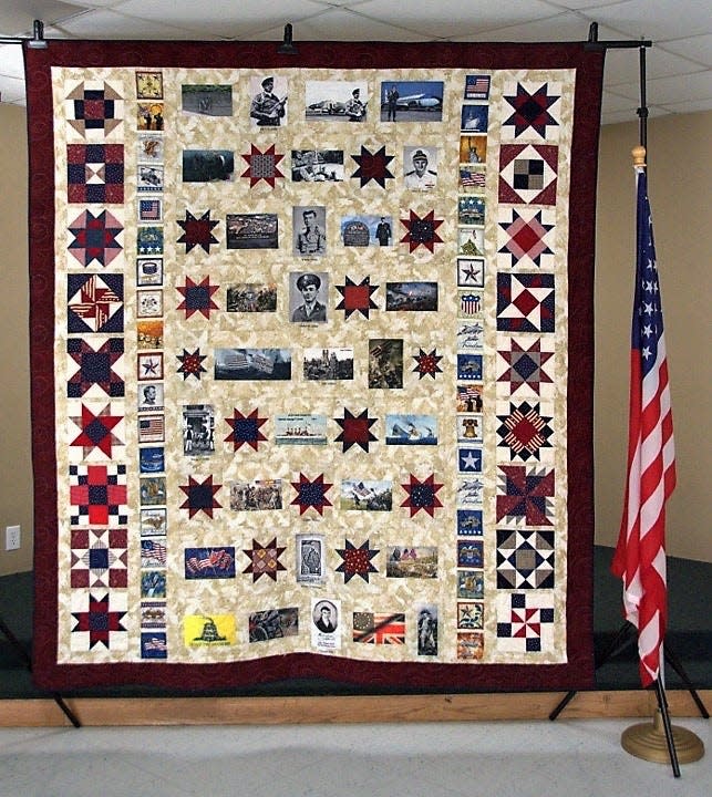 After former House Mountain Quilt Guild member Dorothy Smith died, she left a donation of quilt materials for the group in return for completing this Quilt of Honor for her husband, Larry Smith. Dec. 2, 2021. Corryton Senior Center.