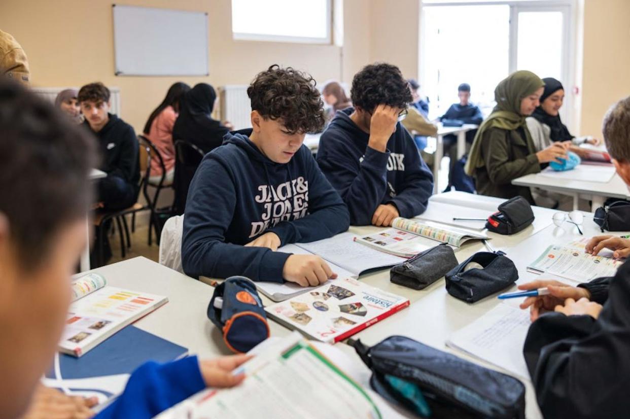 Students attend a class at the Averroès school in Lille, France, in September 2023. <a href="https://www.gettyimages.com/detail/news-photo/students-attend-a-class-at-the-averroes-high-school-in-news-photo/1801185507?adppopup=true" rel="nofollow noopener" target="_blank" data-ylk="slk:Sameer Al-Doumy/AFP via Getty Images;elm:context_link;itc:0;sec:content-canvas" class="link ">Sameer Al-Doumy/AFP via Getty Images</a>