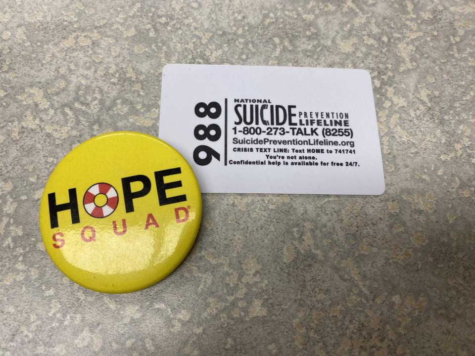 All students at Howell High School have information about the National Suicide Prevention Lifeline on the back of their IDs.