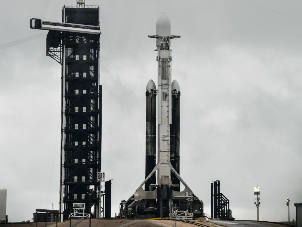 A SpaceX Falcon Heavy rocket sits on pad 39A at Kennedy Space Center on Thursday ahead of launch for the USSF-52 national security mission.