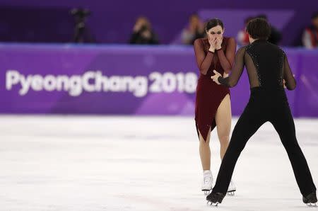 Figure Skating - Pyeongchang 2018 Winter Olympics - Ice Dance free dance competition final - Gangneung, South Korea - February 20, 2018 - Tessa Virtue and Scott Moir of Canada react after their performance. REUTERS/John Sibley