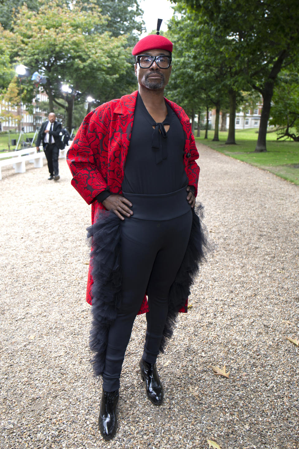 Billy Porter stood out at Erdem's SS20 show wearing a black and white printed coat over a black jumpsuit which featured ruffles on each side. [Photo: Getty Images]