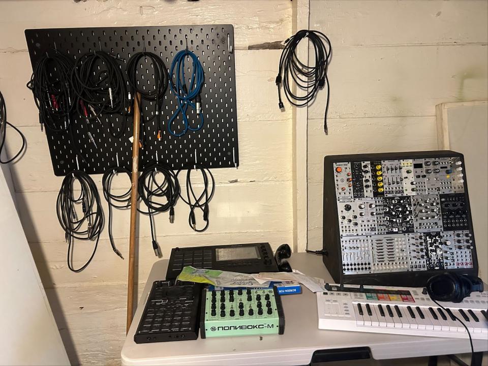 My pegboard full of wires and a couple of expensive devices to make music with.