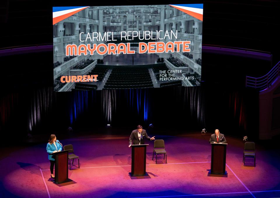 From left, Sue Finkam, Fred Glynn and Kevin Rider take part in the Republican mayoral debate Tuesday, March 28, 2023, at The Palladium in Carmel, Ind. The primary election will be held May 2.