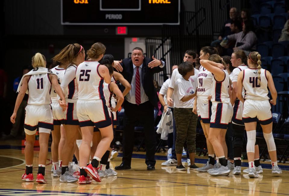 Southern Indiana Head Coach Rick Stein calls in his team during a timeout as the University of Southern Indiana Screaming Eagles play the Morehead State Eagles at Screaming Eagles Arena in Evansville, Ind., Saturday, Jan. 20, 2024.