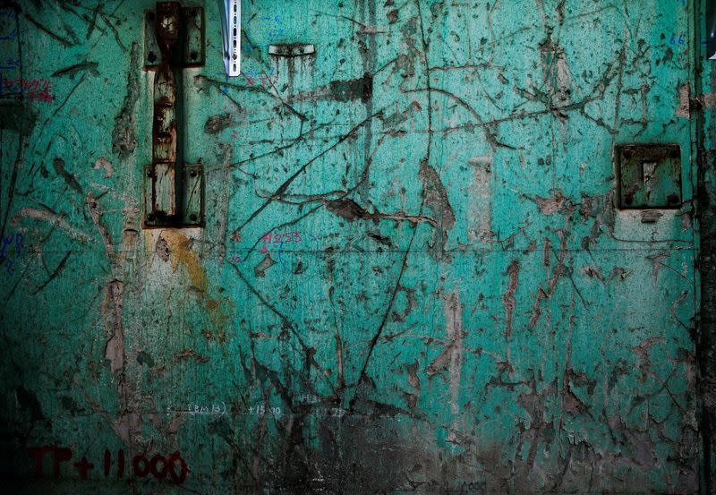 The wall of the No. 3 reactor building is seen at the tsunami-crippled Fukushima Daiichi nuclear power plant in Okuma town