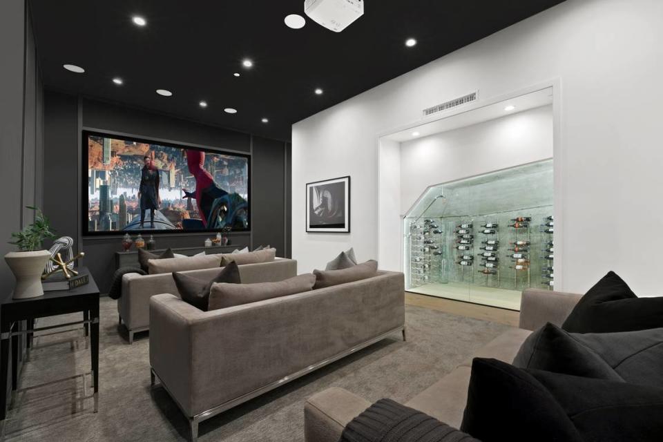 Home theater with wine room.