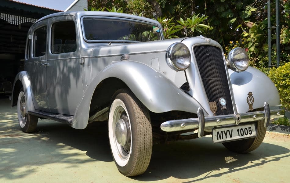 <b>Car:</b> Austin 14<br><b>Year:</b> 1939 <br><b>Owner:</b> Cheshire Homes India (King and Partridge oversaw the sale, they were solicitors to the estate of McGucken, who originally owned the house)<br><b>Story:</b> Sulaiman moved from Coimbatore to Bangalore and started his career as a junior engineer. He bought his first car an Austin 14 (1939) for Rs 4000 in 1979. After buying the car he drove the car to 2 Stroke Motors. “They were known for their painting and body shop work. It was restored in no time and I was bitten by the bug.”