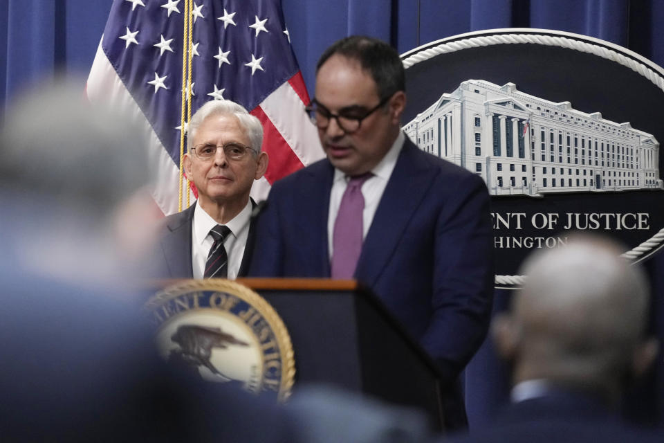 Attorney General Merrick Garland looks to Assistant Attorney General Jonathan Kanter of the Justice Department's Antitrust Division as he speaks at the Department of Justice in Washington, Tuesday, Jan. 24, 2023. The Justice Department and several states have sued Google, alleging that its dominance in digital advertising harms competition. (AP Photo/Carolyn Kaster)