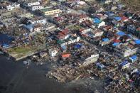 This aerial photo shows destroyed houses in the town of Guiuan in Eastern Samar province, central Philippines on November 11, 2013