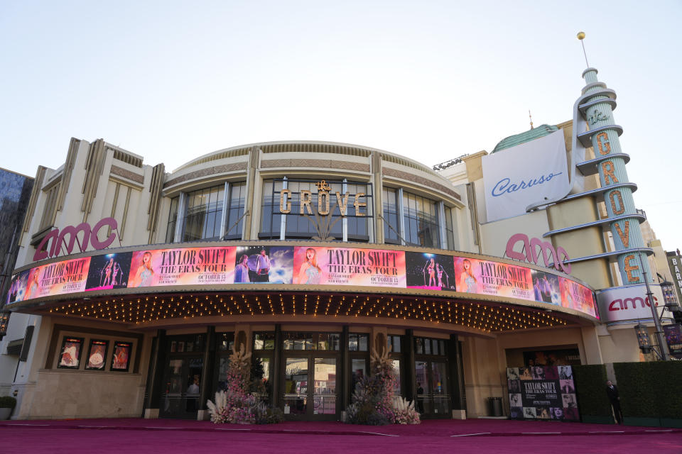 A marquee featuring the concert film "Taylor Swift: The Eras Tour" is seen prior to the world premiere on Wednesday, Oct. 11, 2023, at AMC The Grove 14 in Los Angeles. (AP Photo/Chris Pizzello)