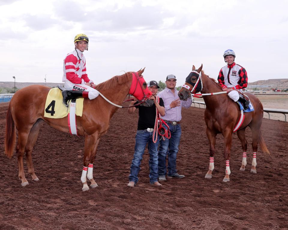 Brothers Adrian Ramos (left, aboard Kj Wicked Wanda) and Christian Ramos (right, aboard Mr Red White N Blue) finished in a dead heat for the win in the $75,000-added Four Corners Futurity at SunRay Park and Casino, Sunday, May 22, 2022.