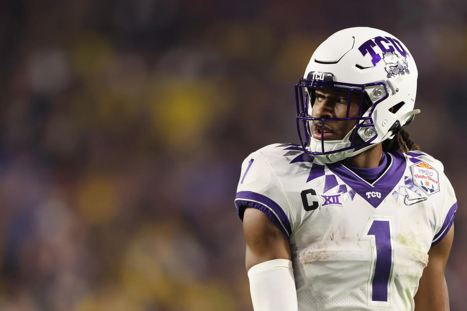 GLENDALE, ARIZONA - DECEMBER 31: Wide receiver Quentin Johnston #1 of the TCU Horned Frogs lines up against the Michigan Wolverines during the fourth quarter of the Vrbo Fiesta Bowl at State Farm Stadium on December 31, 2022 in Glendale, Arizona. The Horned Frogs defeated the Wolverines 51-45.  (Photo by Christian Petersen/Getty Images)