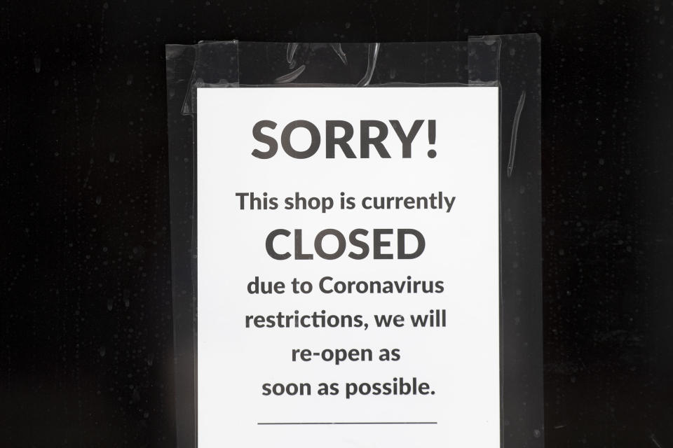 CARDIFF, UNITED KINGDOM - MAY 21: A sign in the window of a closed small business on May 21, 2020 in Cardiff, United Kingdom. The British government has started easing the lockdown it imposed two months ago to curb the spread of Covid-19, abandoning its 'stay at home' slogan in favour of a message to 'be alert', but UK countries have varied in their approaches to relaxing quarantine measures. (Photo by Matthew Horwood/Getty Images)