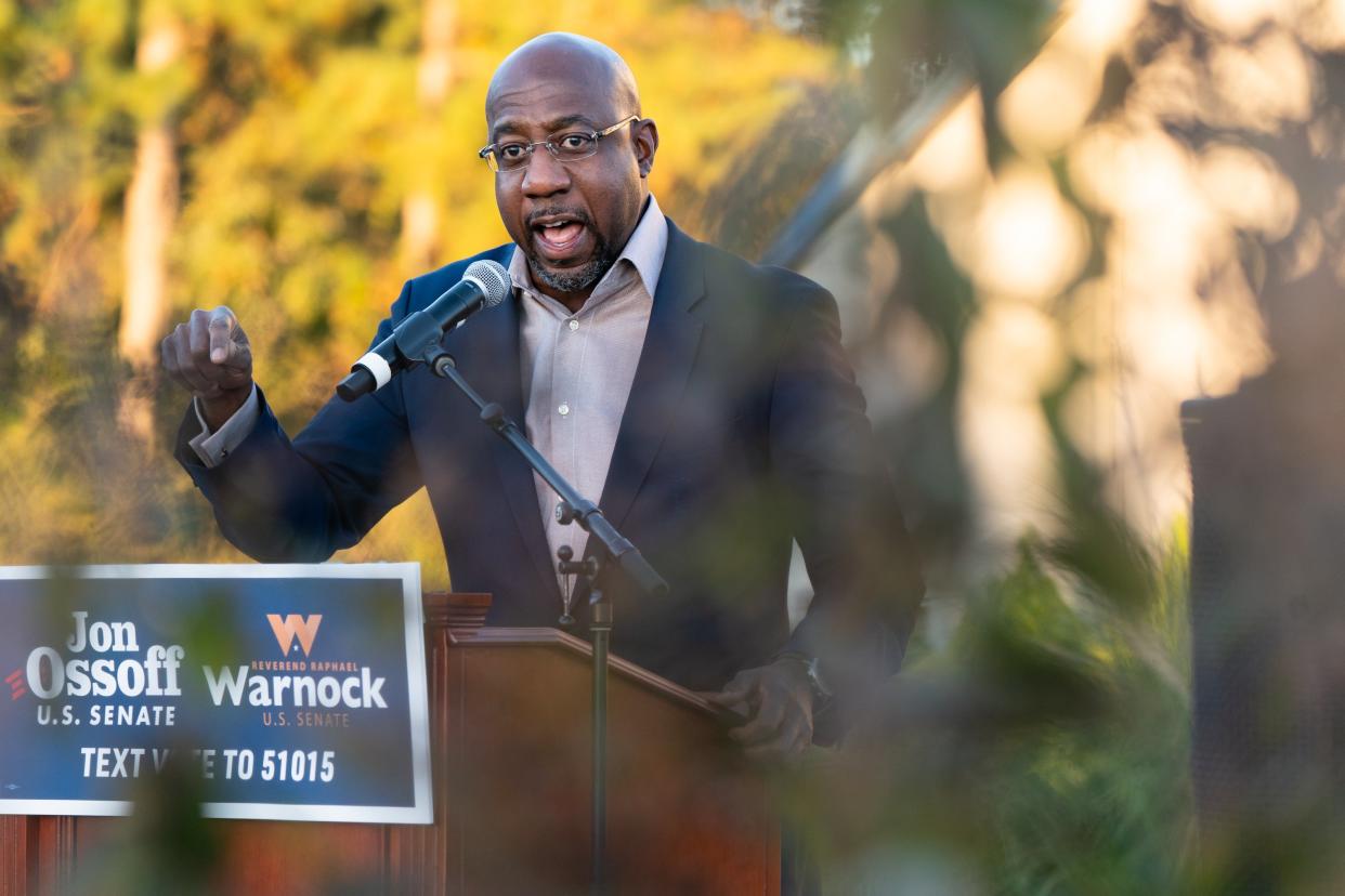 Georgia Democrat Raphael Warnock is leading Senator Kelly Loeffler in their run-off special election, according to a new poll. (Getty Images)