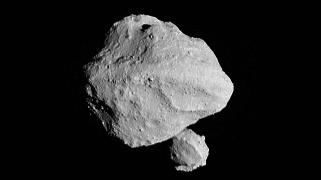  Two grey rocks in space. 