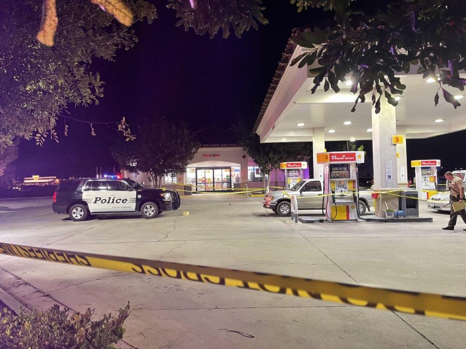 Ventura County Sheriff's deputies with the Camarillo unit investigate a shooting at the Shell station at Los Posas Road and Ventura Boulevard Friday night, Oct. 29, 2021.