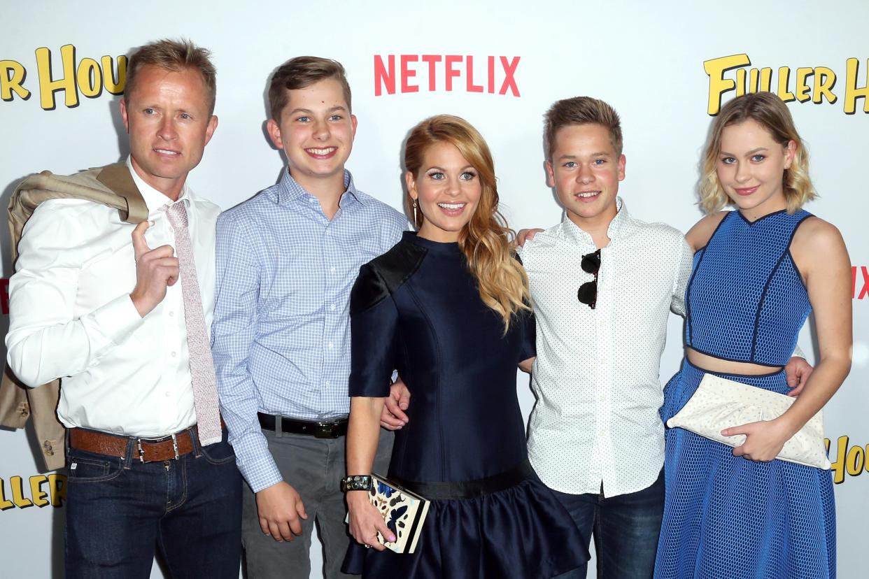 Valeri Bure, Lev Valerievich Bure, actress Candace Cameron-Bure, Maksim Valerievich Bure, and Natasha Valerievna Bure attend the premiere of Netflix's "Fuller House"