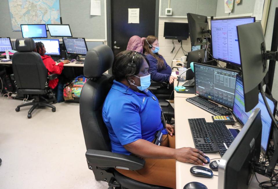 911 operators monitor calls and radio dispatches at the Chatham County 911 Call Center on Tuesday, February 20, 2024.