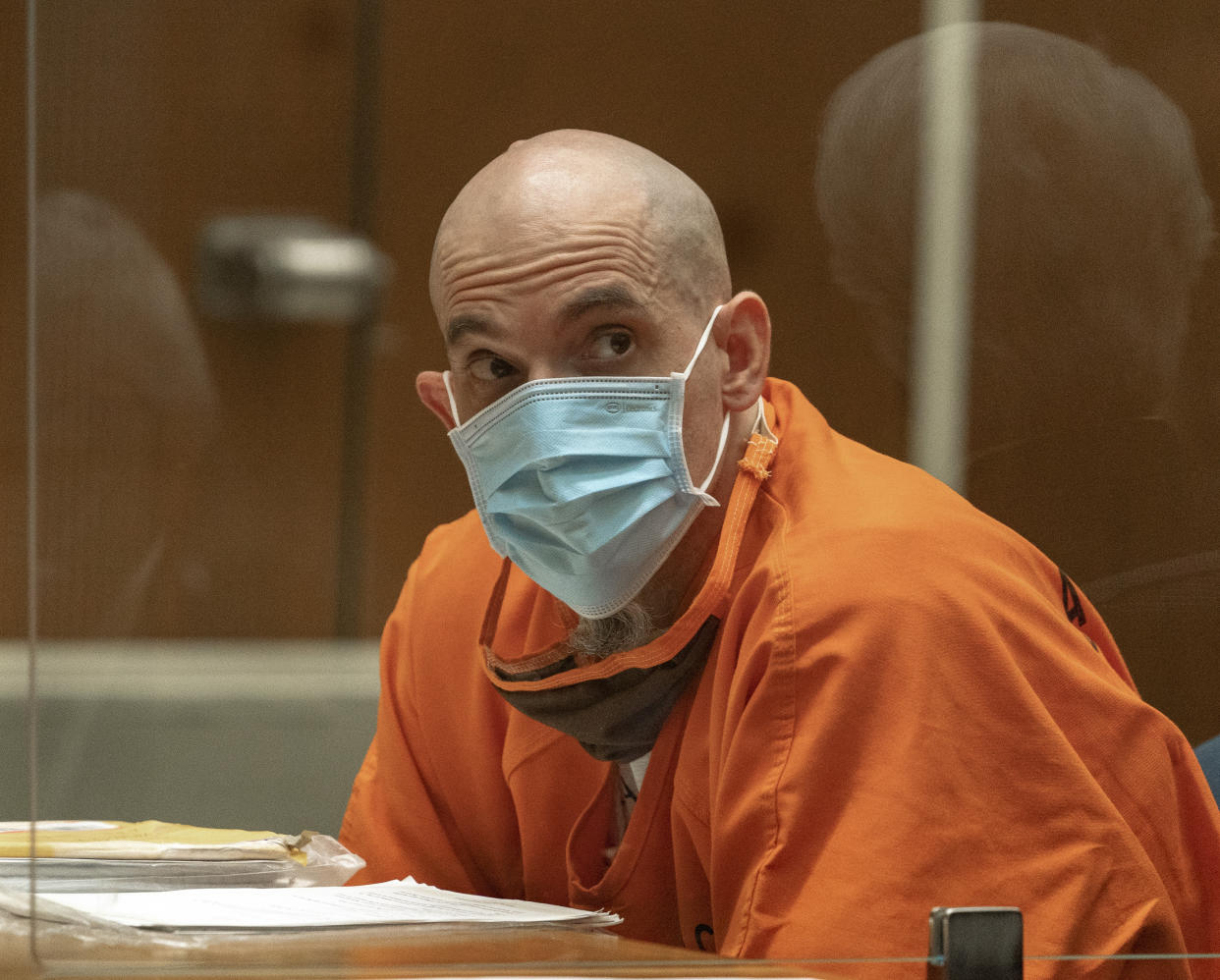 Michael Thomas Gargiulo listens to his defense attorney Daniel Nardoni, as he pleads for his life during a sentencing hearing at Los Angeles Superior Court, Friday, July 16, 2021. A judge denied a new trial for Garigiulo, a man prosecutors called “The Boy Next Door Killer,” who could be sentenced to death later Friday for the home-invasion murders of two women and the attempted murder of a third.   (AP Photo/Damian Dovarganes)