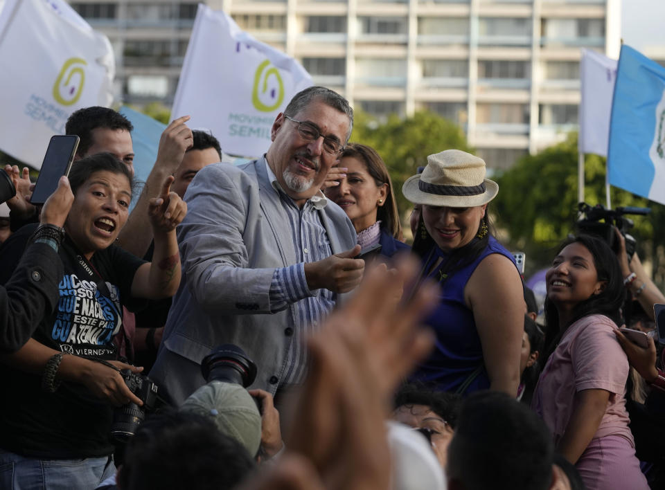 Guatemalan presidential candidate Bernardo Arevalo of the Semilla party celebrates the election results with supporters at Constitution Square in Guatemala City, Monday, June 26, 2023. Arevalo and former first lady Sandra Torres of the UNE party are going to an Aug. 20 presidential runoff. (AP Photo/Moises Castillo)