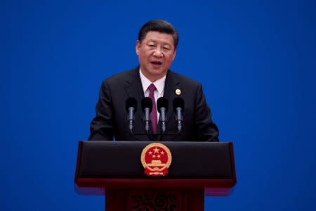 FIULE PHOTO: Chinese President Xi Jinping speaks during a briefing on the final day of the Belt and Road Forum, at the Yanqi Lake International Conference Centre, north of Beijing, China May 15, 2017.  REUTERS/Nicolas Asfouri/Pool