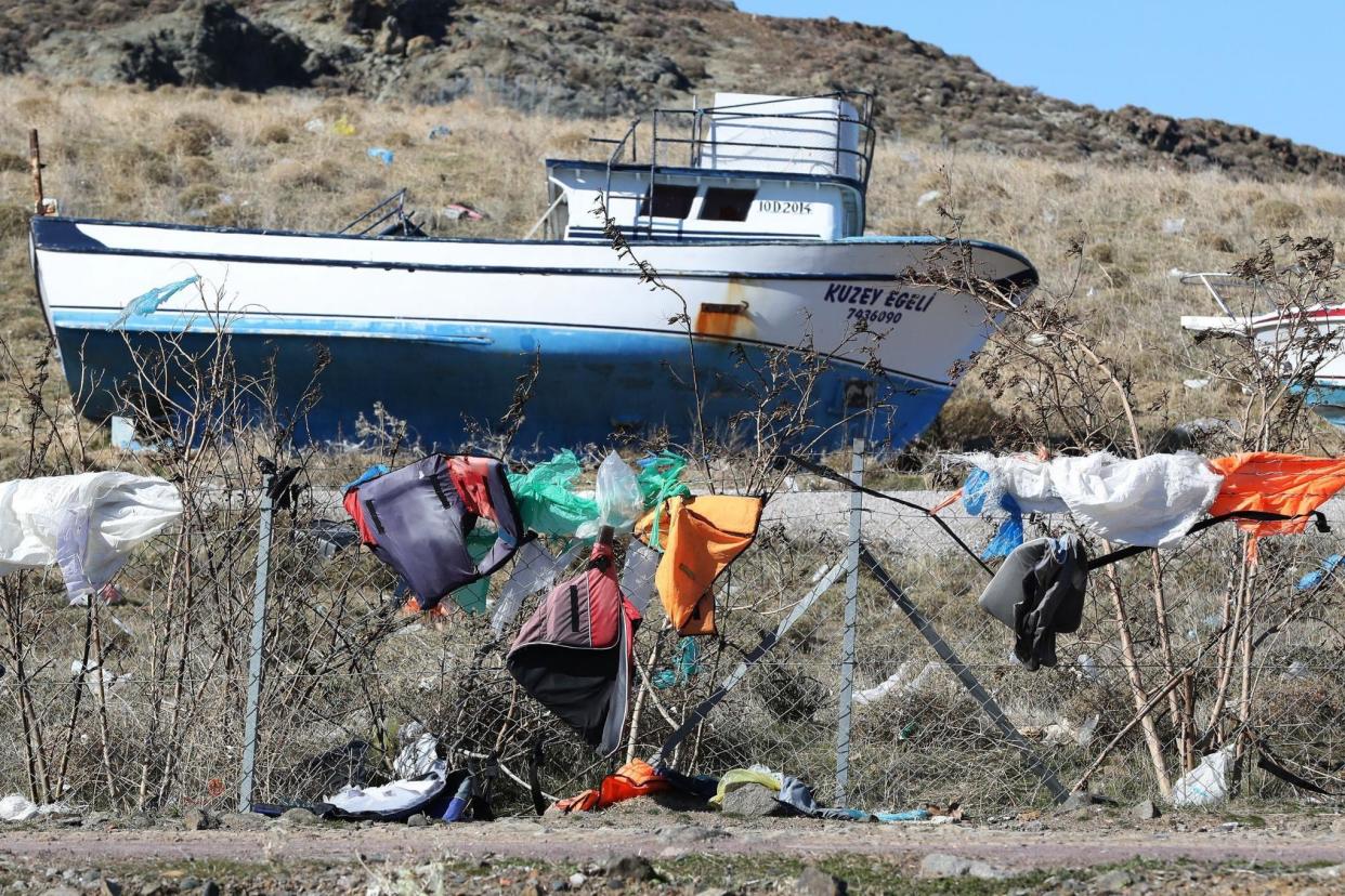 A file picture of used life jackets and disused boats on the Greek island of Lesbos: PA