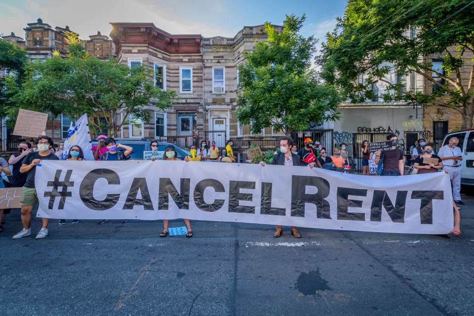 Participants hold a #CancelRent banner at the protest. Tenants and Housing Activists gathered at Maria Hernandez Park for a rally and march in the streets of Bushwick, demanding the city administration to cancel rent immediately as the financial situation for many New Yorkers remains the same, strapped for cash and out of work. (Erik McGregor/LightRocket via Getty Images)