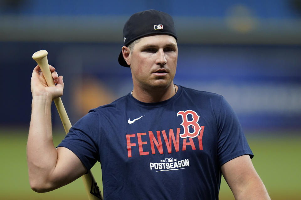 Boston Red Sox right fielder Hunter Renfroe swings a bat during the baseball team's practice Wednesday, Oct. 6, 2021, in St. Petersburg, Fla., for an AL Division Series matchup against the Tampa Bay Rays that starts Thursday. (AP Photo/Chris O'Meara)