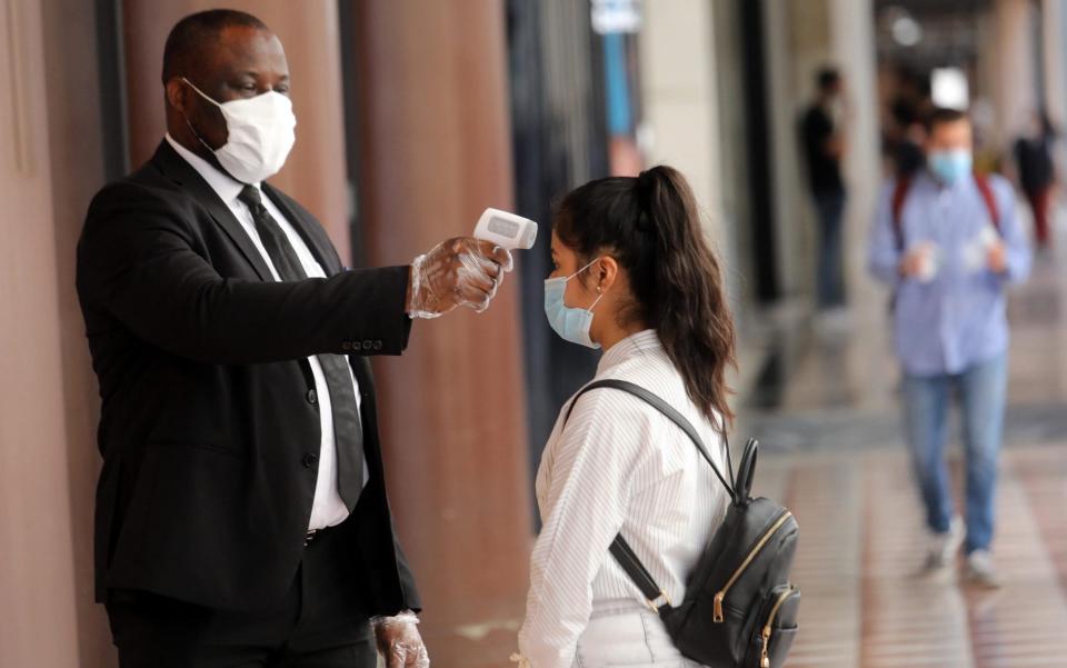  body temperature check milan - MATTEO BAZZI/EPA-EFE/Shutterstock