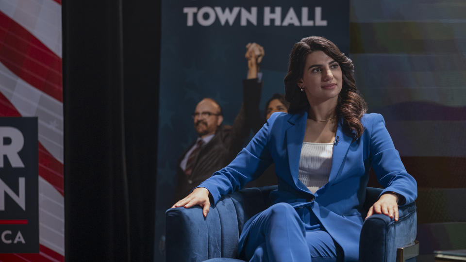 Victoria Neuman sits in a chair during an event in Gen V