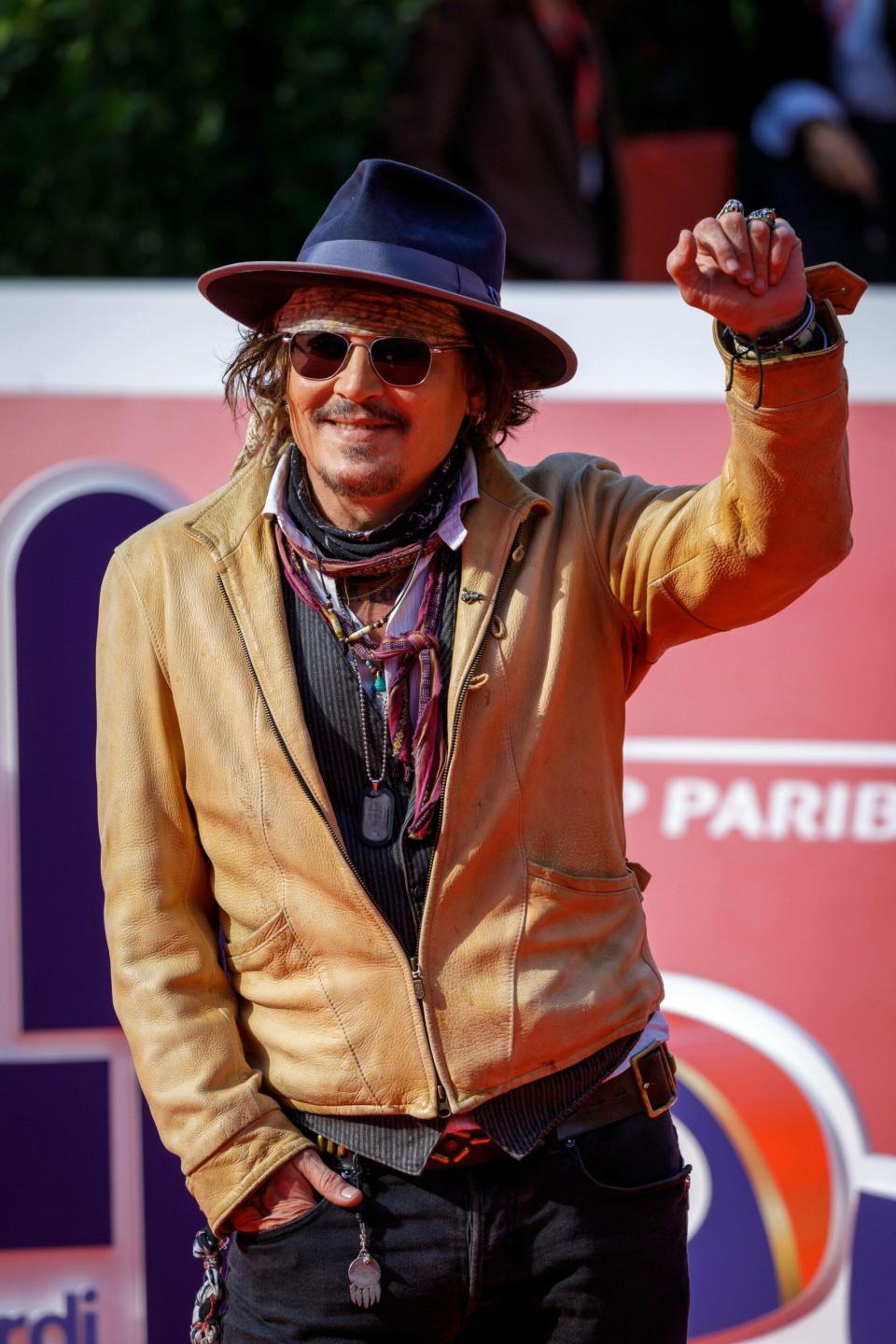 Italy: Johnny Depp walks the red carpet at the Rome Cinema Fest