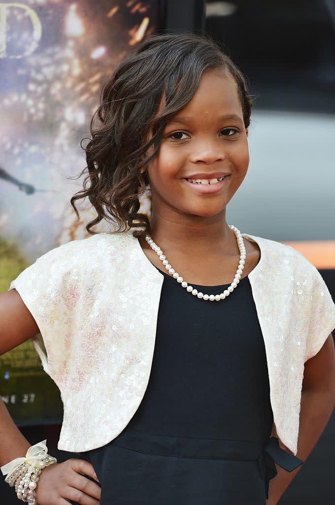 Closeup of Quvenzhané Wallis smiling on the red carpet